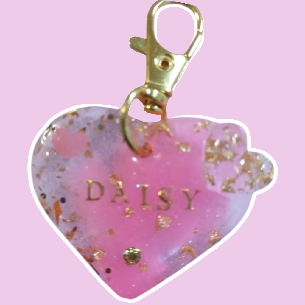 Light pink and white cat ID tag with gold